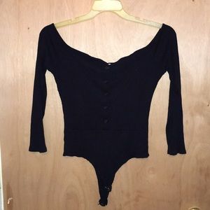 Off the shoulder button body suit